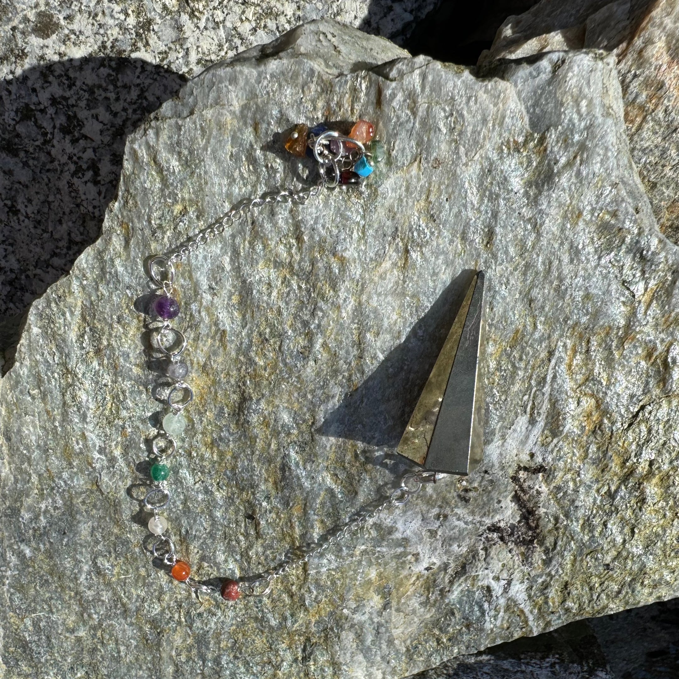 Black and Gold Chakra Pyrite Pendulum with Matching Chakra Stones on Chain - Divination Tool, Energy Healing, Spiritual Insight - The Celestial Boutique